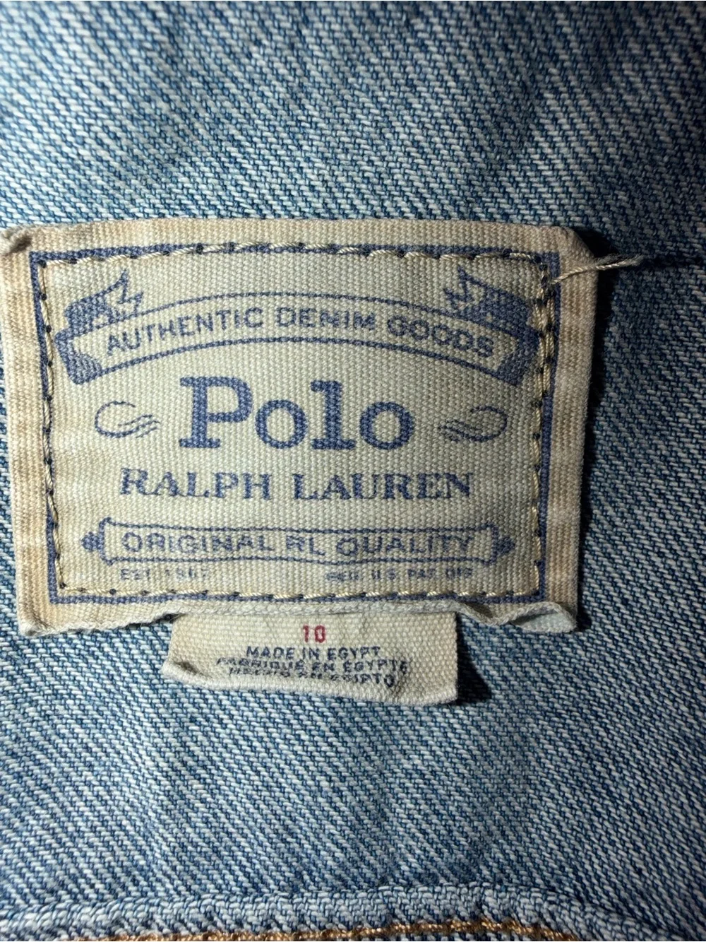 Ralph Lauren Polo Light Blue Denim distressed Jacket. Polo print on the back.